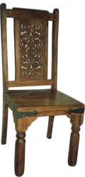 carved back wooden chair